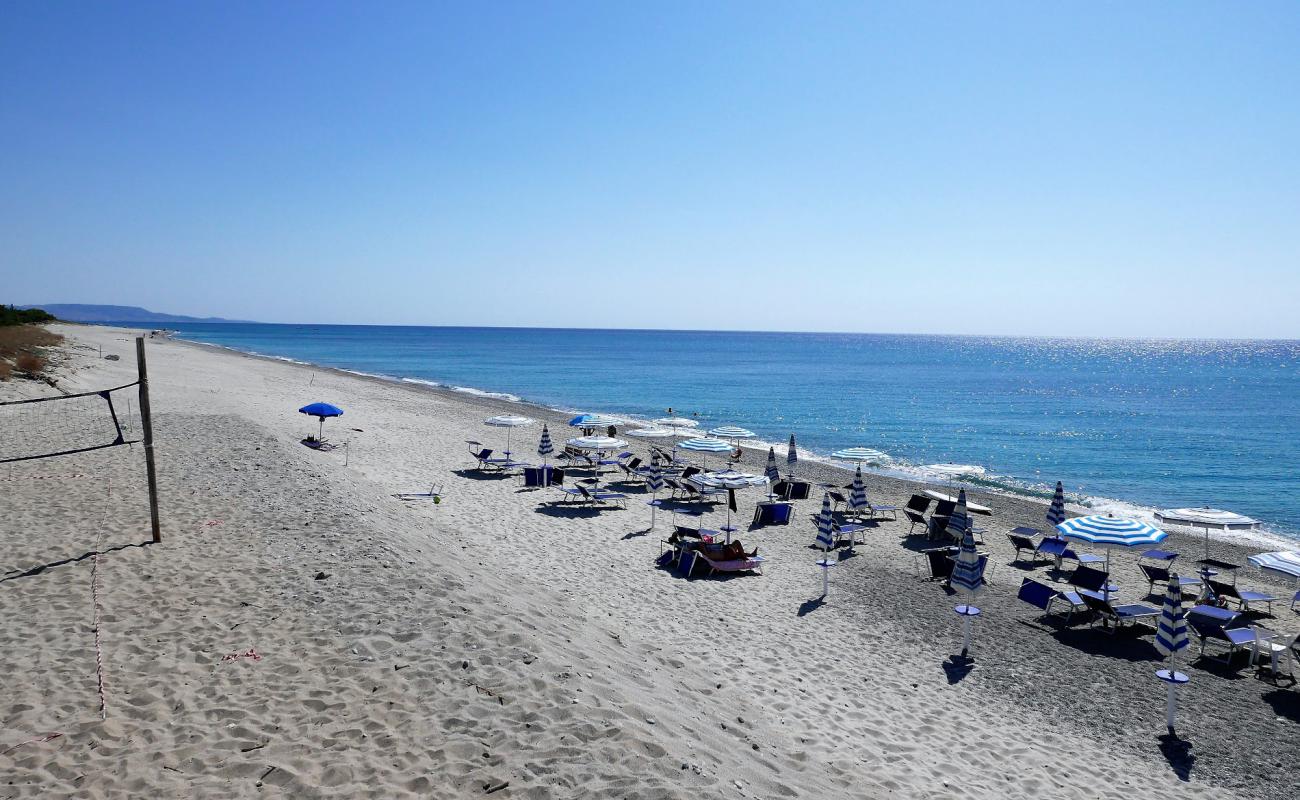 Фото Portigliola's Beach с песок с галькой поверхностью