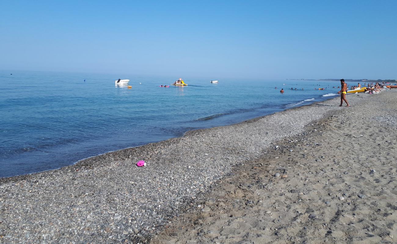 Фото Sami beach с песок с галькой поверхностью