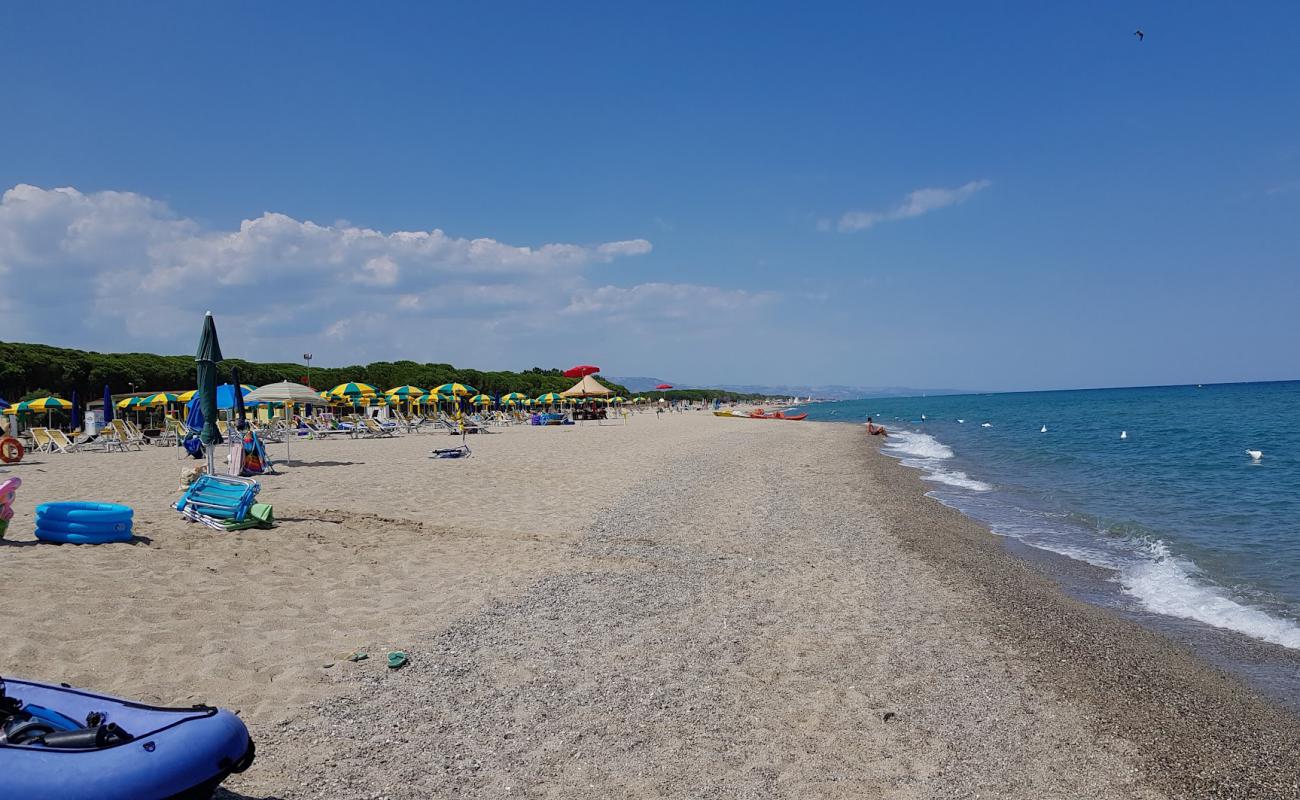 Фото Salicetti beach с светлый песок поверхностью