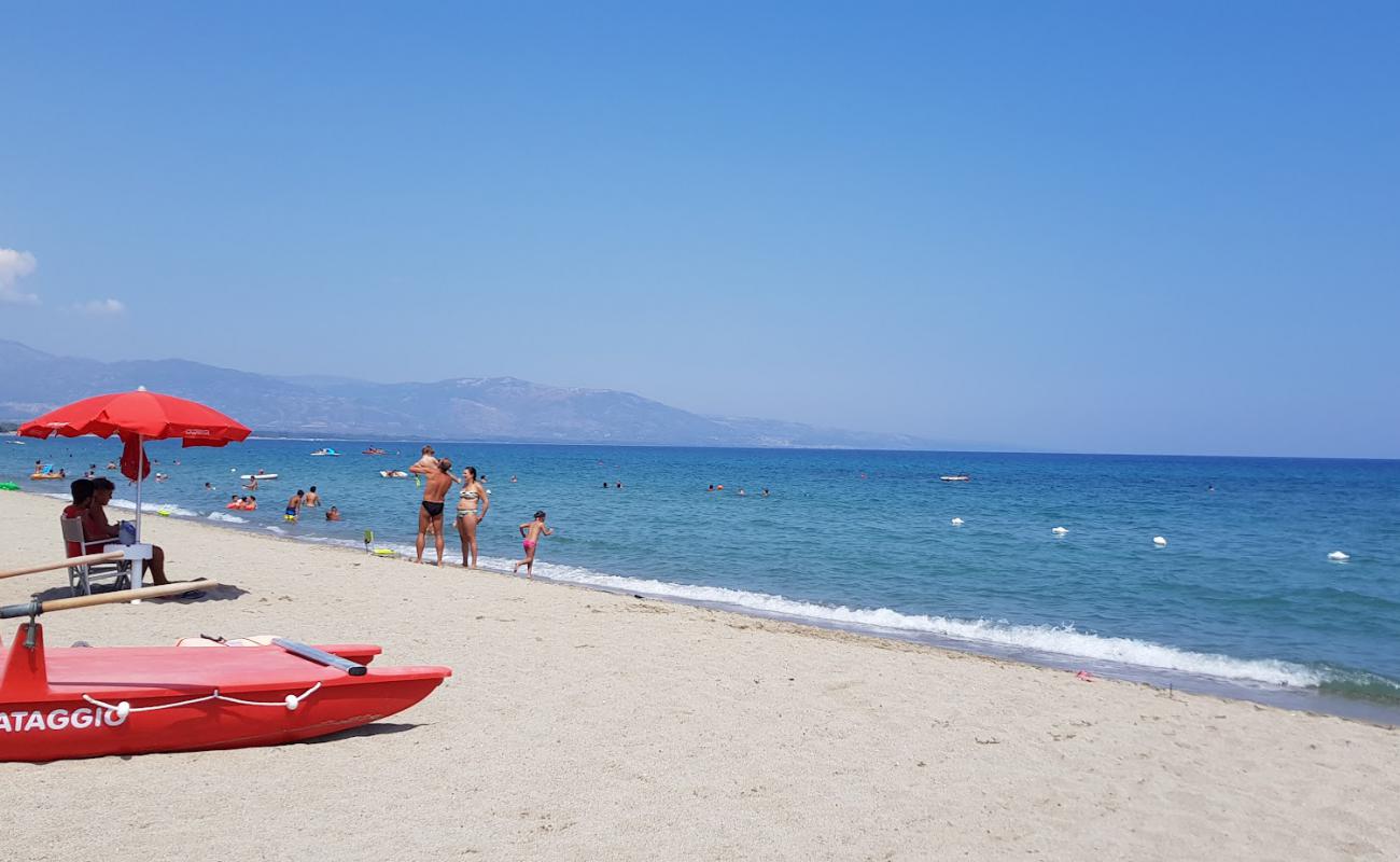 Фото Papagayo beach с светлый песок поверхностью