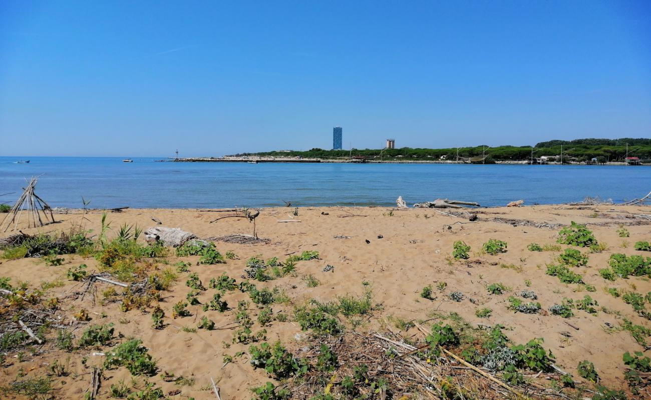 Фото Spiaggia del Mort с светлый песок поверхностью