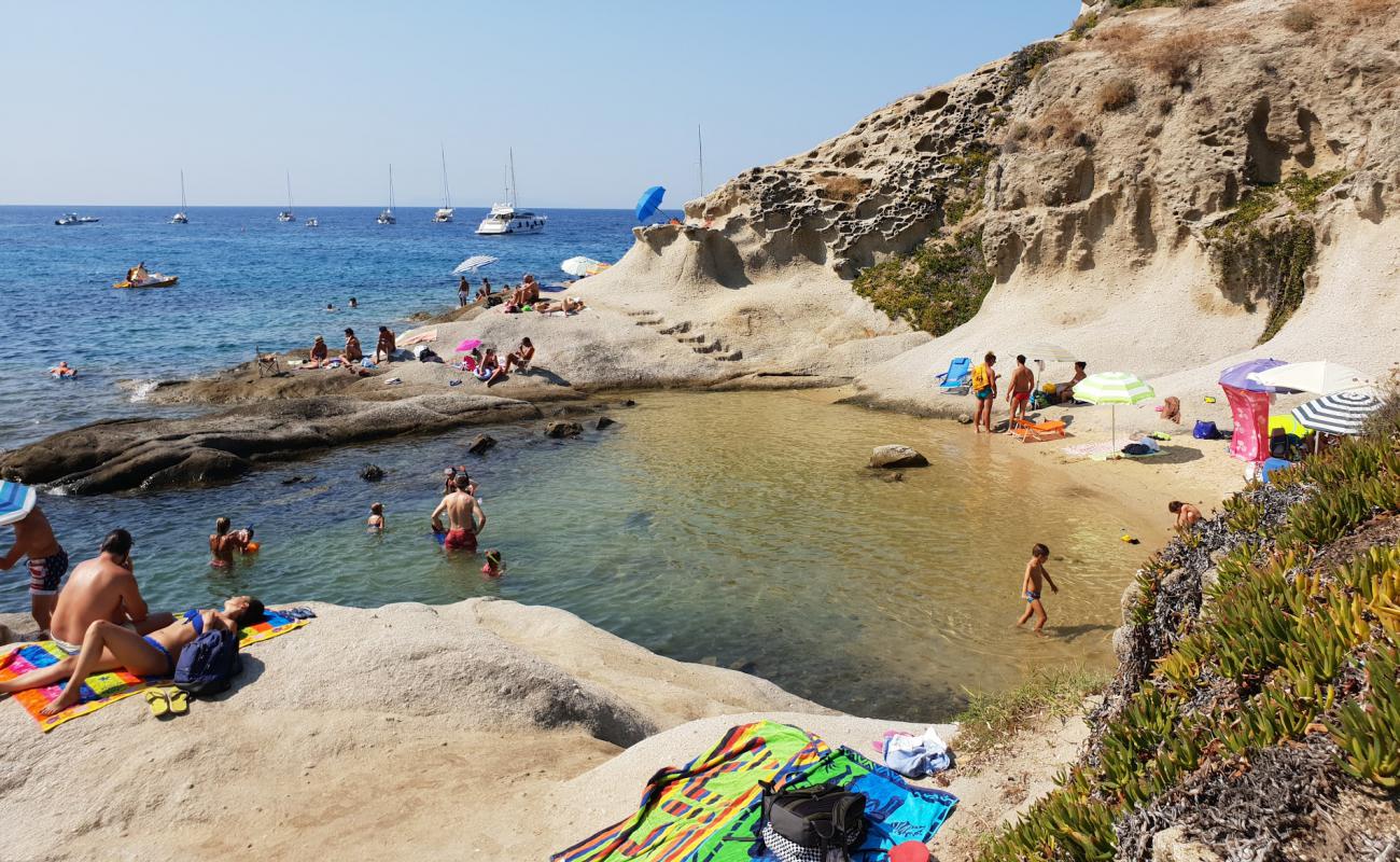 Фото Cotoncello's Beach с светлый песок поверхностью