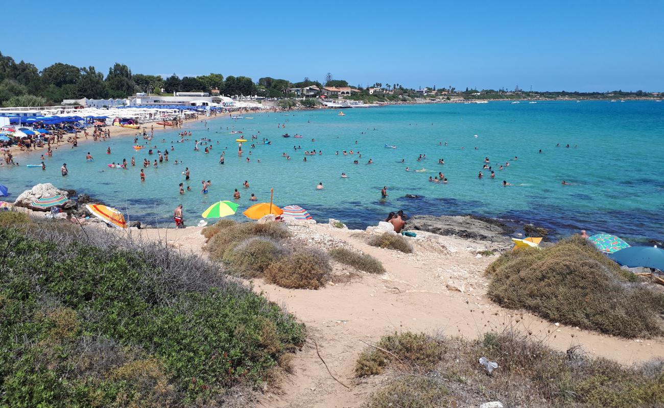 Фото Spiaggia dell'Arenella с темный песок поверхностью