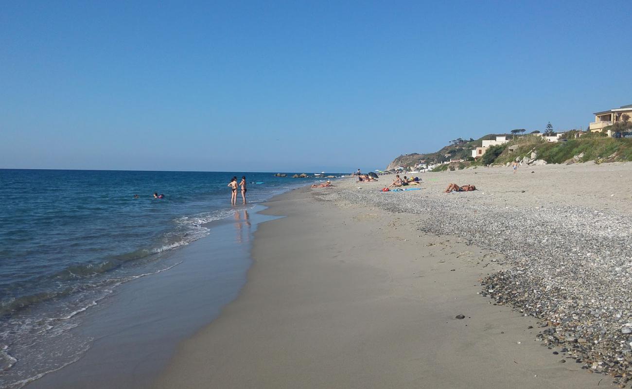 Фото San Saba beach с светлый песок поверхностью