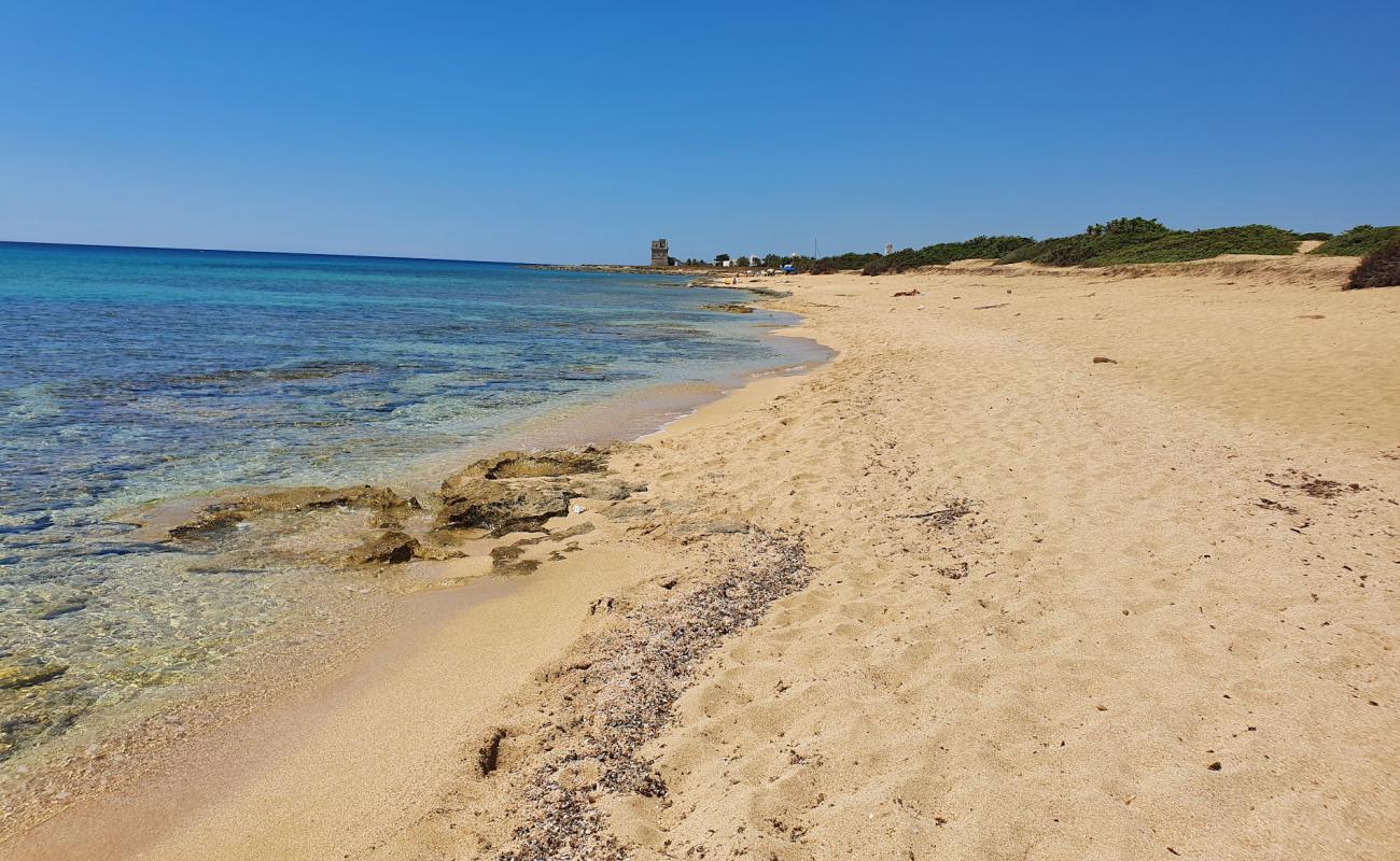 Фото Spiaggia di Punta Cacata с светлый песок поверхностью