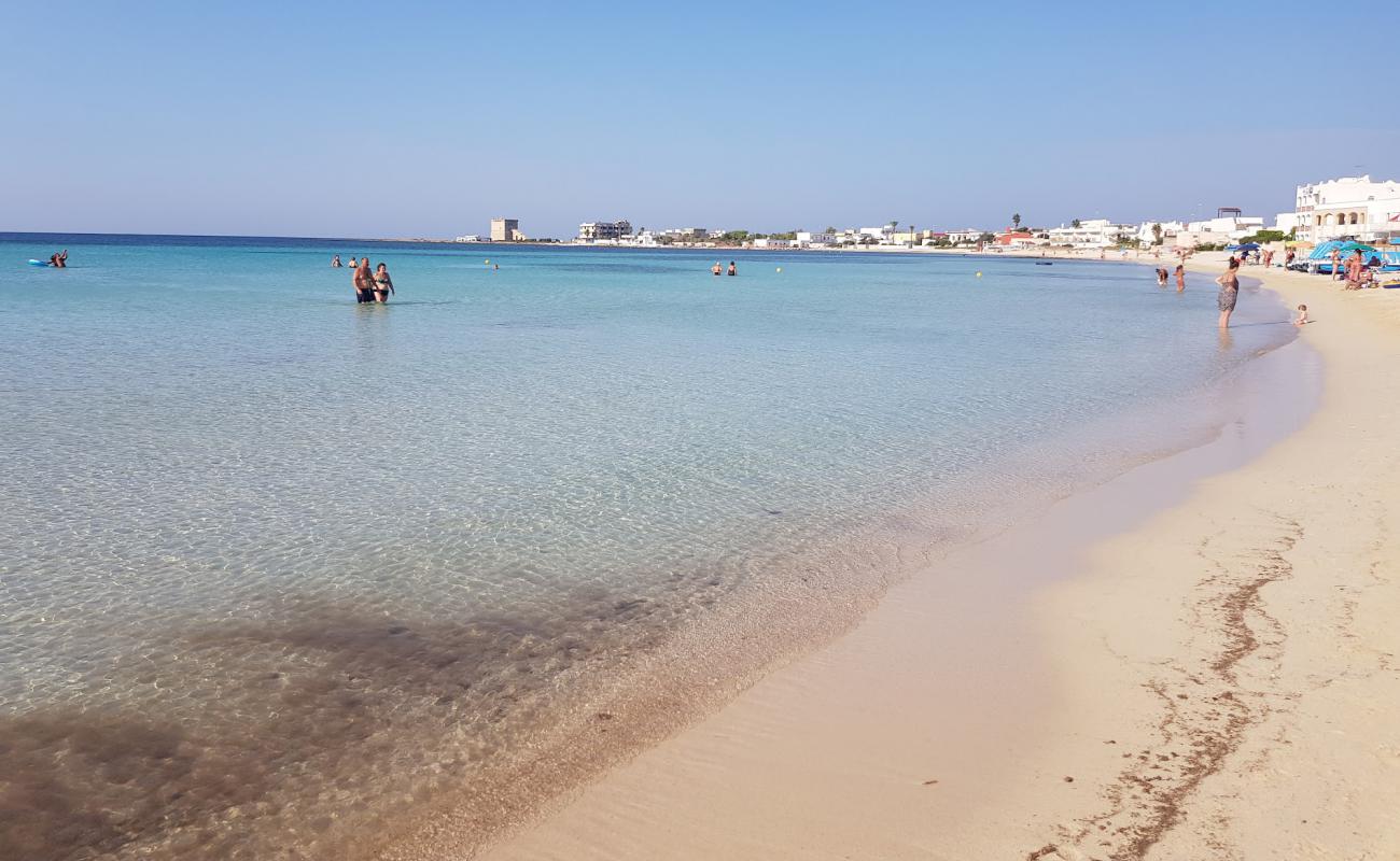 Фото Spiaggia Porto Cesareo с светлый песок поверхностью