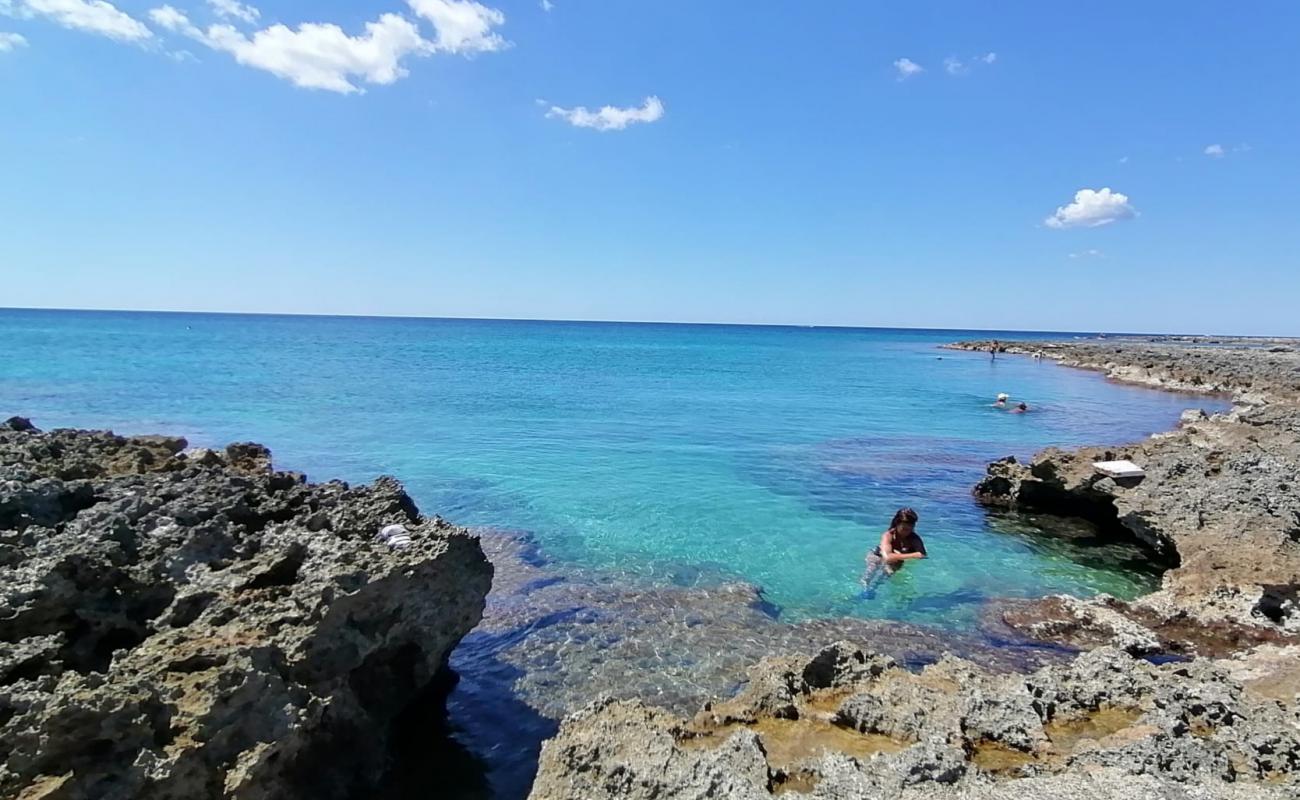 Фото Spiaggia di Scianuli с камни поверхностью