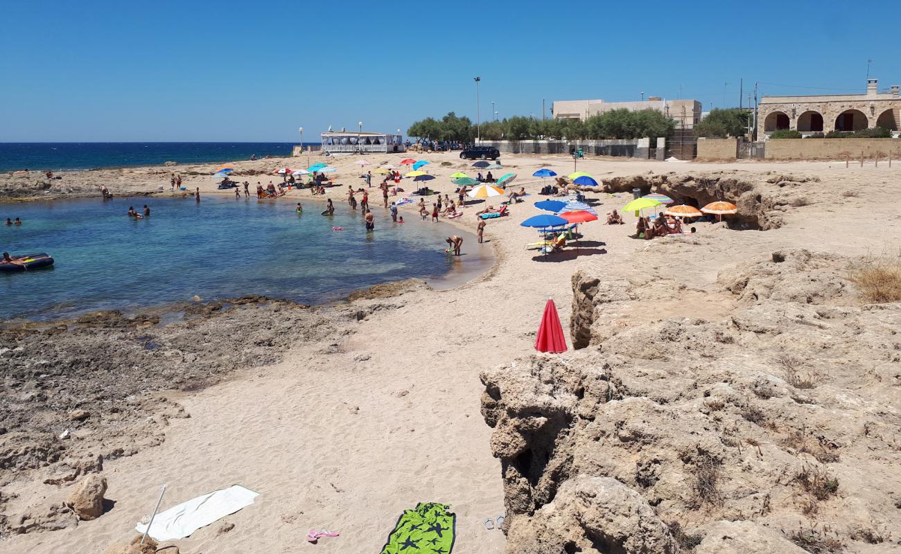 Фото Spiaggia del Mare dei Cavalli с светлый песок поверхностью