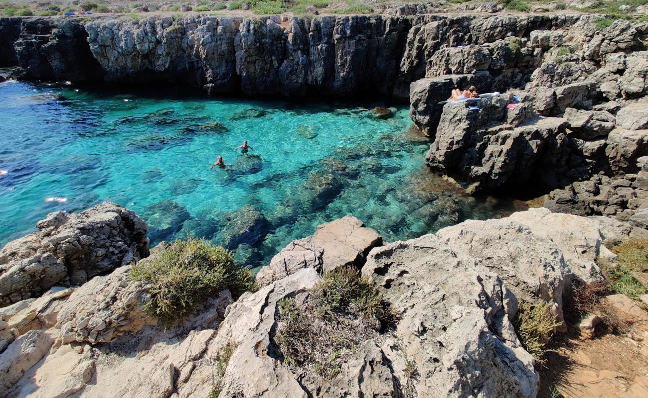 Фото Baia dei Diavoli с бетон поверхностью