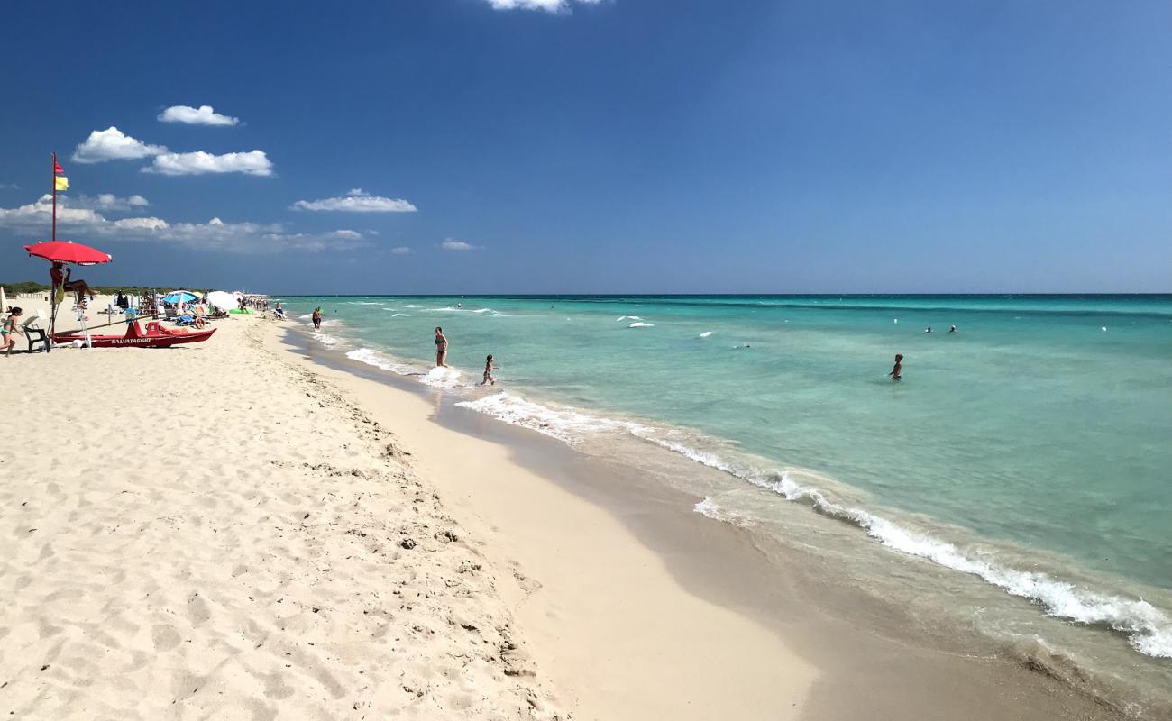 Фото Fontanelle beach с золотистый песок поверхностью