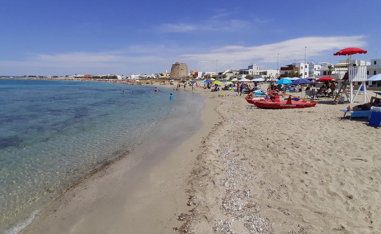 Фото Spiaggia di Torre Mozza II с золотистый песок поверхностью