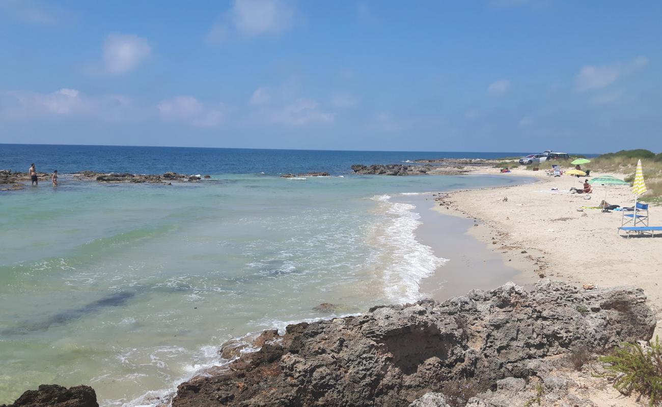 Фото Spiaggia calette di salve с золотистый песок поверхностью