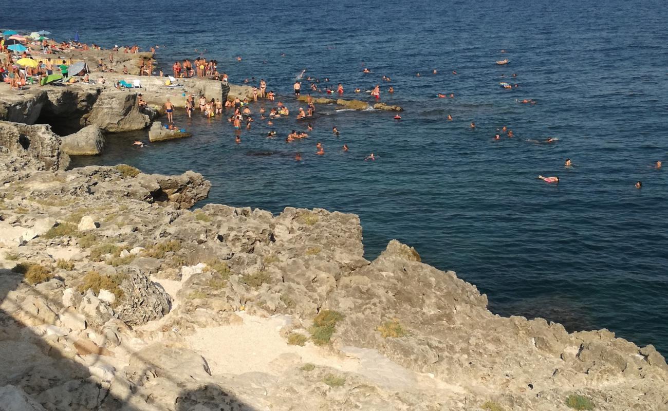 Фото Spiaggia delle Agavi с камни поверхностью