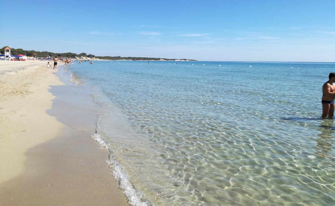 Фото Spiaggia Alimini с золотистый песок поверхностью