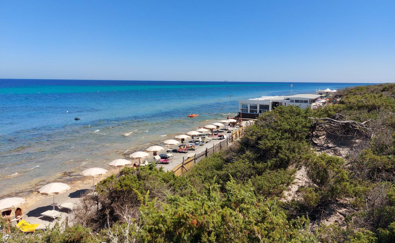 Фото Frassanito beach с светлый песок поверхностью