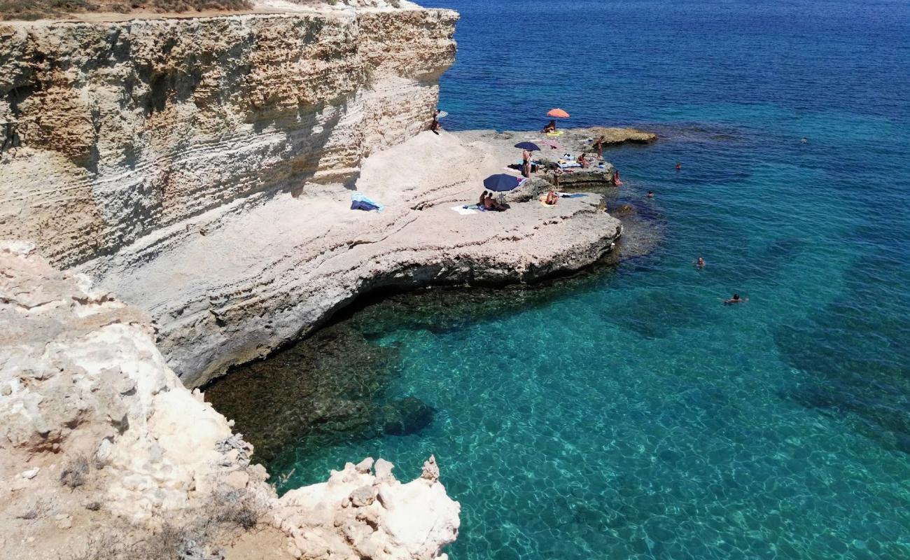 Фото Spiaggia Torre Sant'Andrea с камни поверхностью