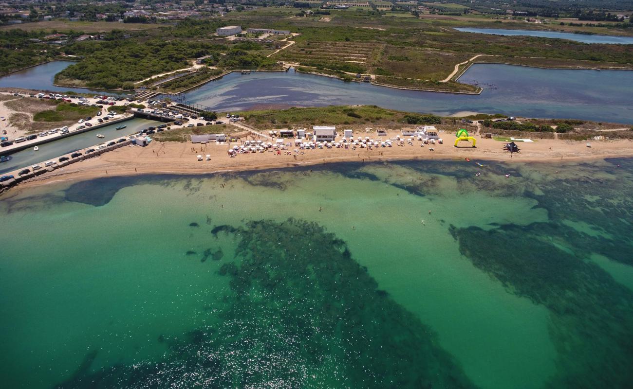 Фото Istmo beach с светлый песок поверхностью