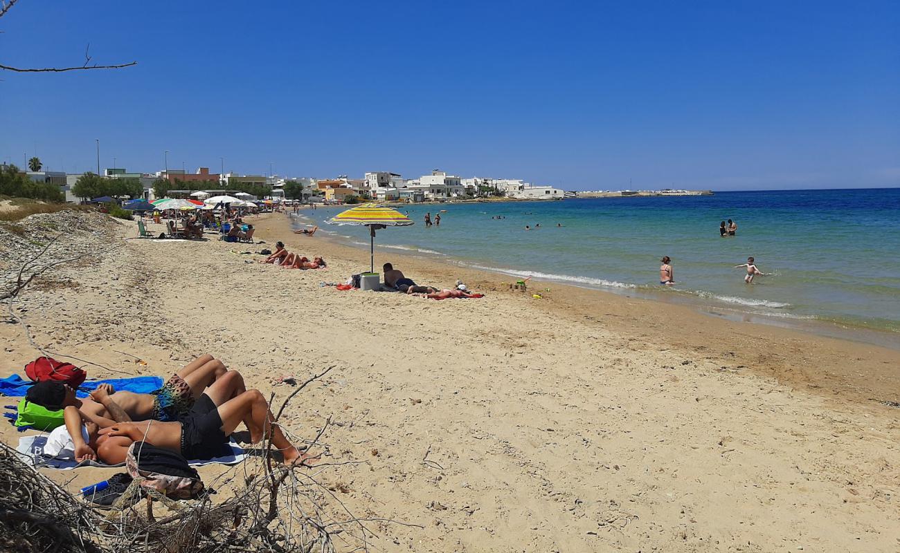 Фото Olindo's beach с светлый песок поверхностью