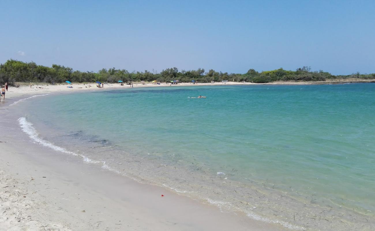 Фото Spiaggia di Torre Guaceto с золотистый песок поверхностью