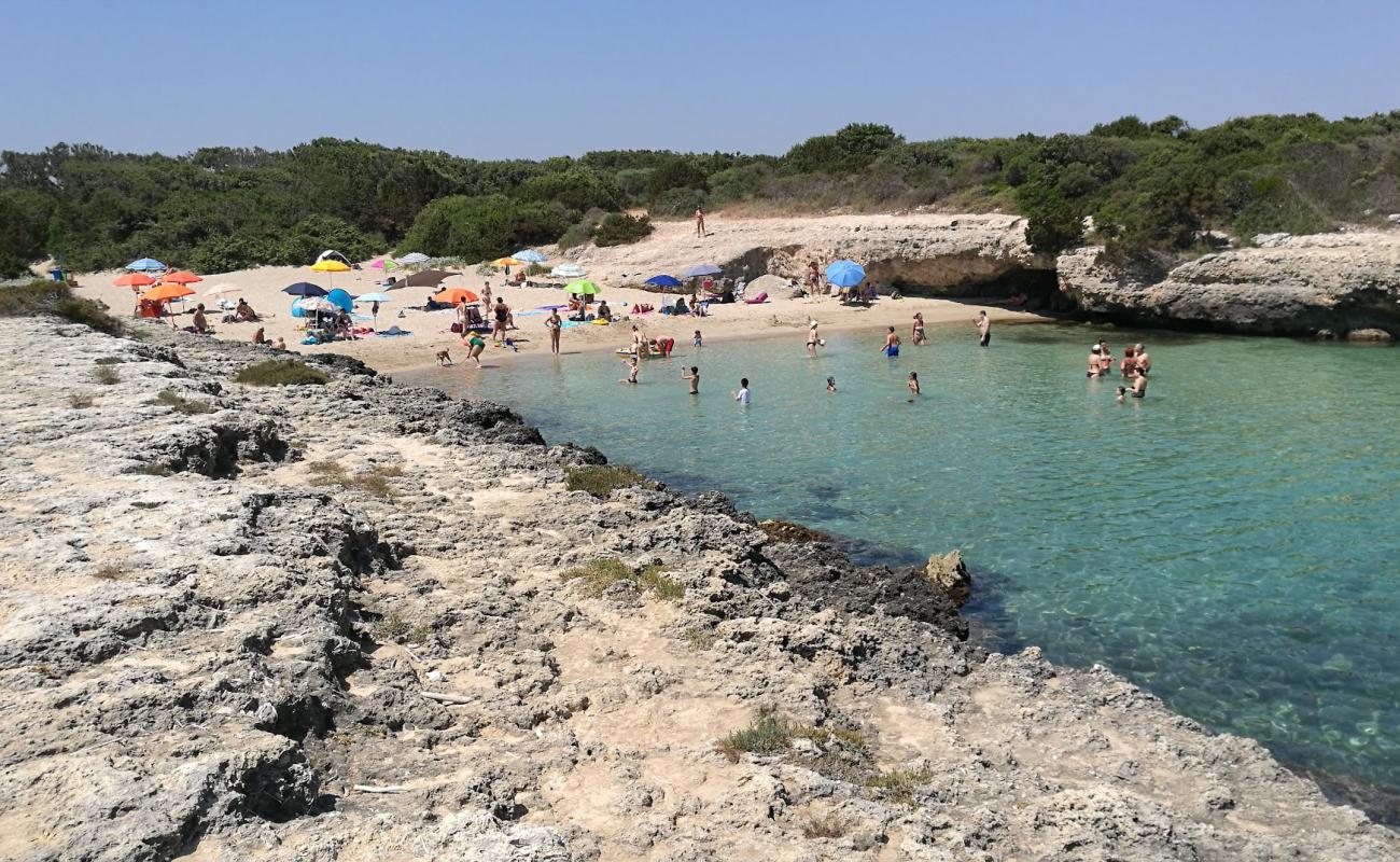 Фото Spiaggia di Torre Pozzelle с светлый песок поверхностью