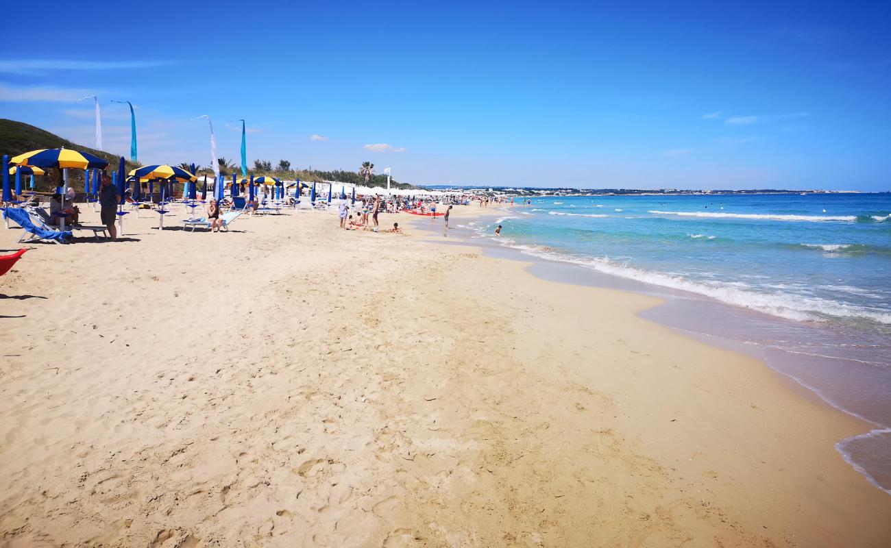 Фото Sabbiadoro beach с светлый песок поверхностью