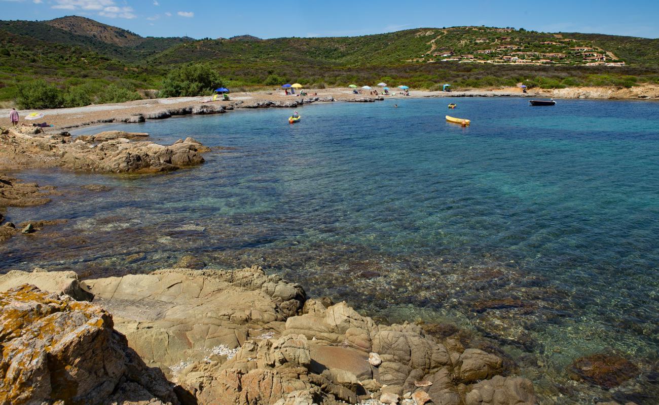 Фото Li Marini beach с песок с галькой поверхностью