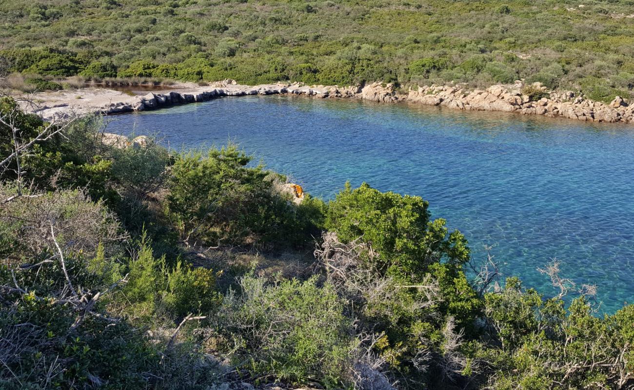 Фото Cala dei Francesi с камни поверхностью