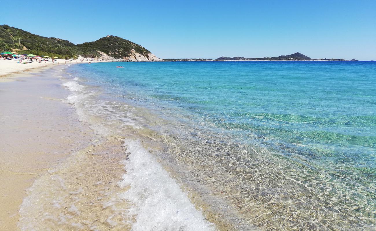 Фото Spiaggia di Campus с золотистый песок поверхностью