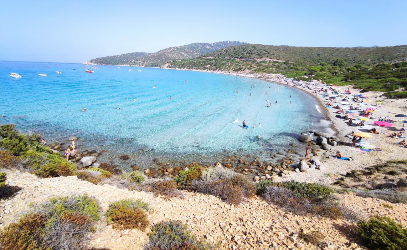 Фото Spiaggia di Mari Pintau с светлая галька поверхностью