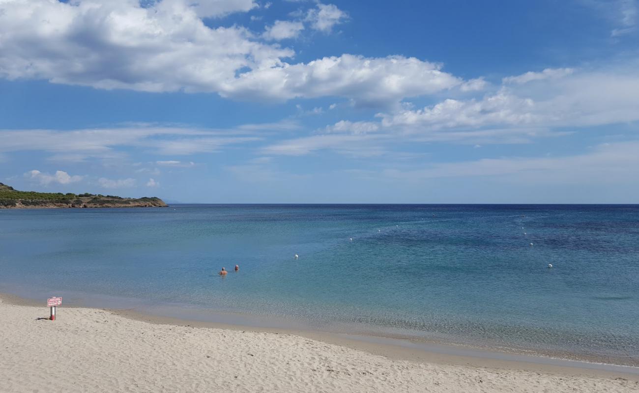 Фото Spiaggia dei Fichi с светлый песок поверхностью