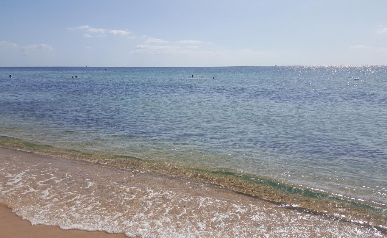 Фото Spiaggia di Campumatta с золотистый песок поверхностью