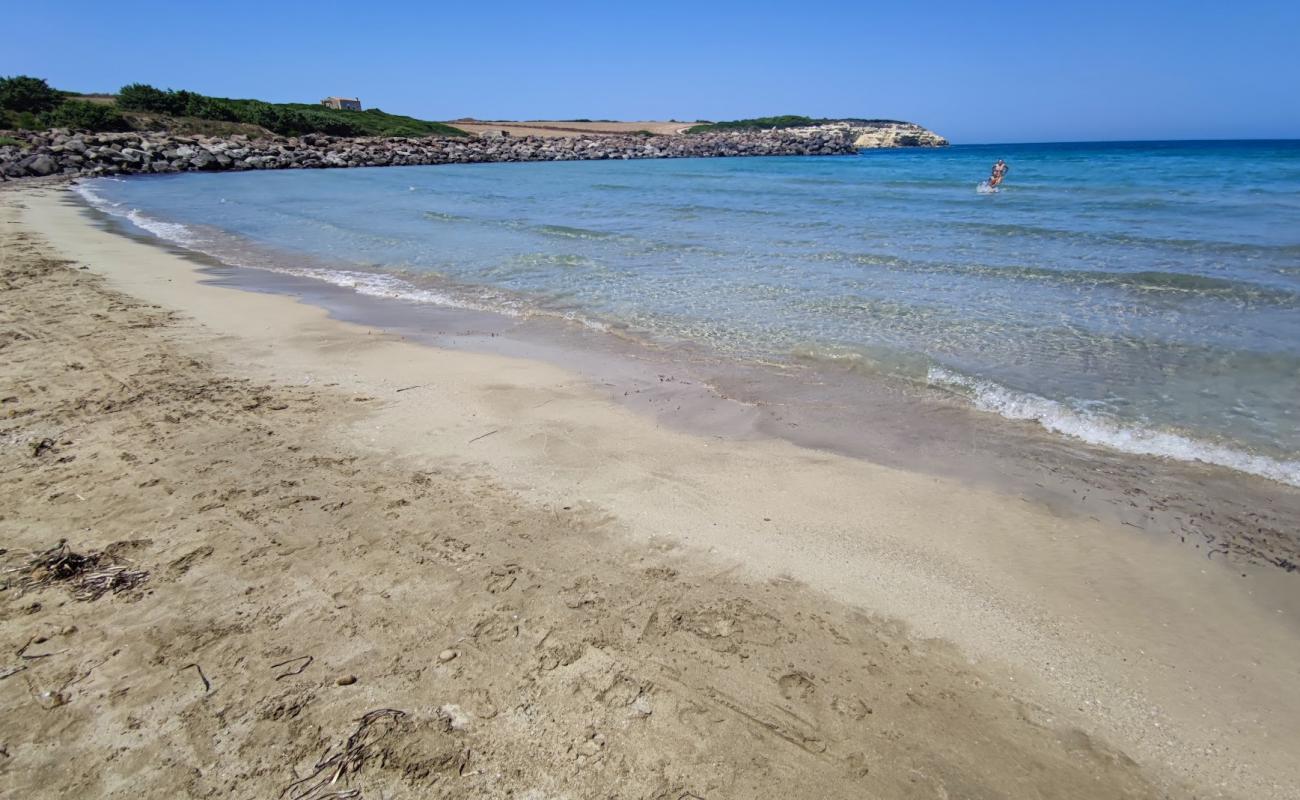 Фото Spiaggia Di Is Benas с светлый песок поверхностью