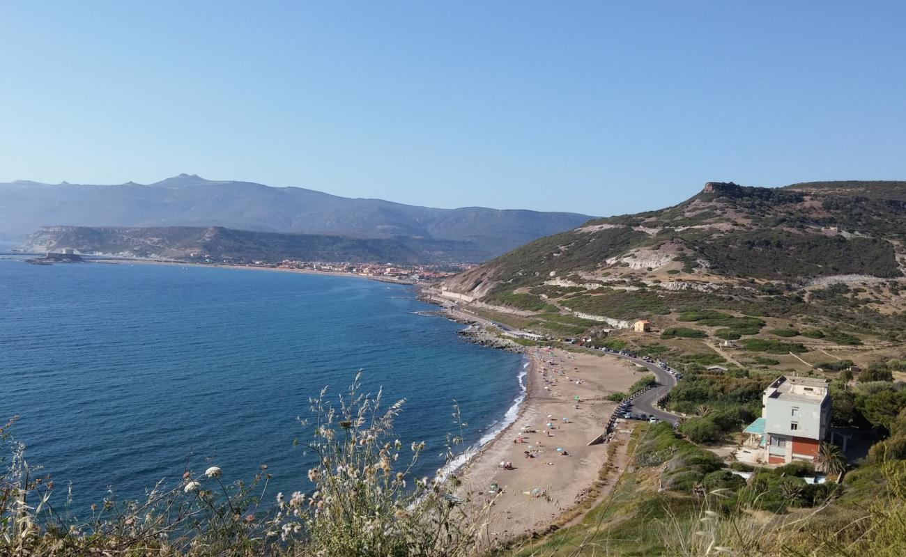 Фото Turas beach с светлый песок поверхностью