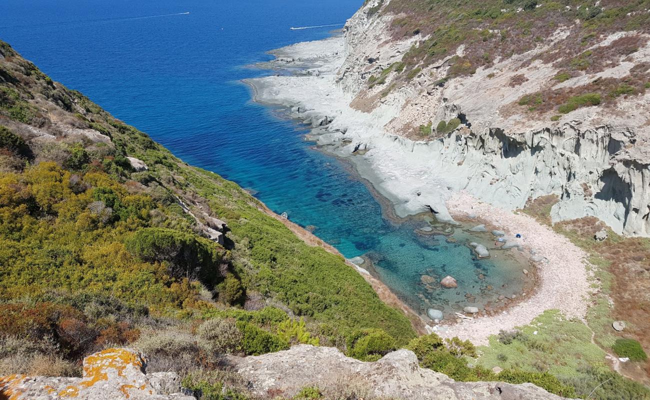 Фото Cala ' E Moro с камни поверхностью