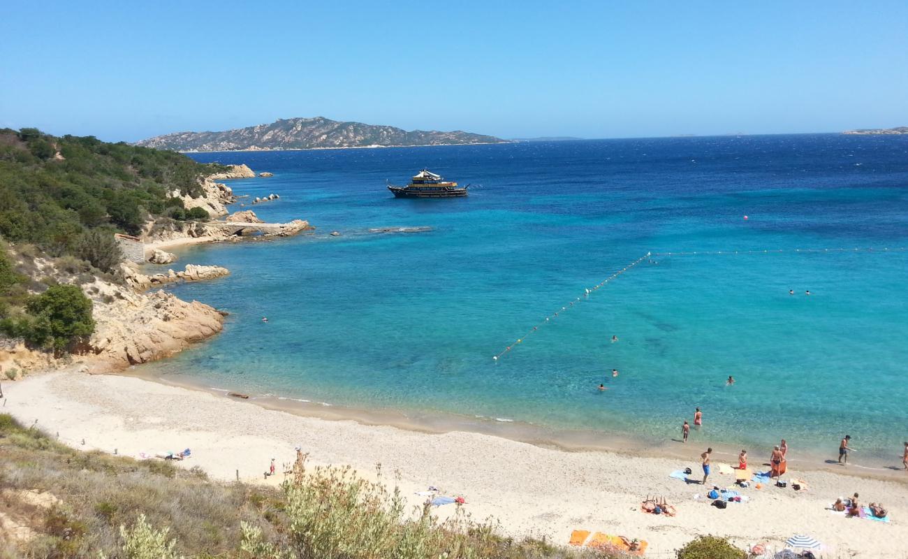 Фото Spiaggia di Cala di Trana с темный песок поверхностью