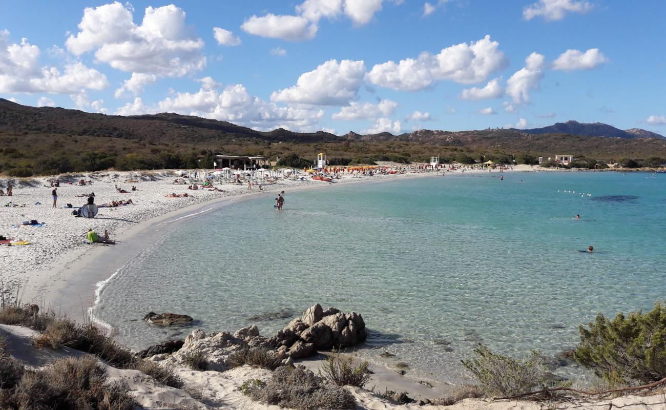 Фото Spiaggia di Portisco с светлый песок поверхностью