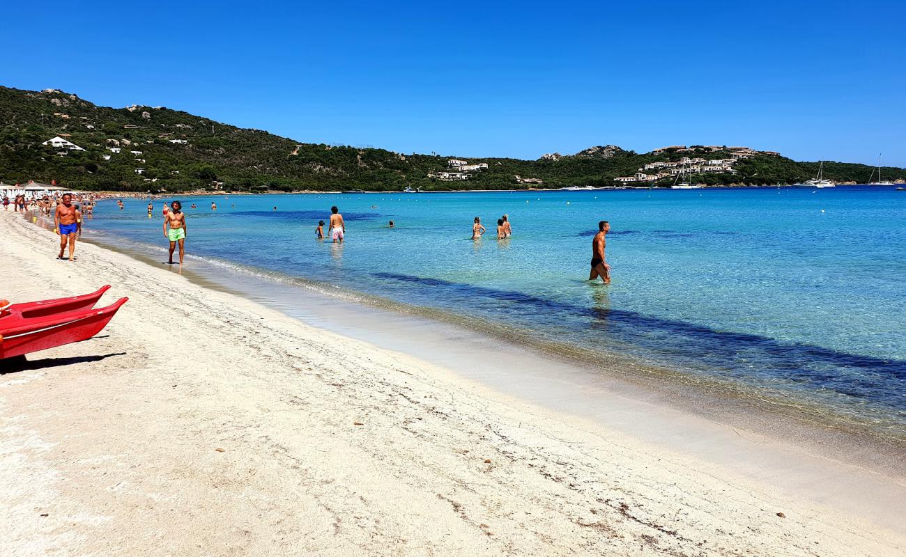 Фото Spiaggia di Marinella с золотистый песок поверхностью