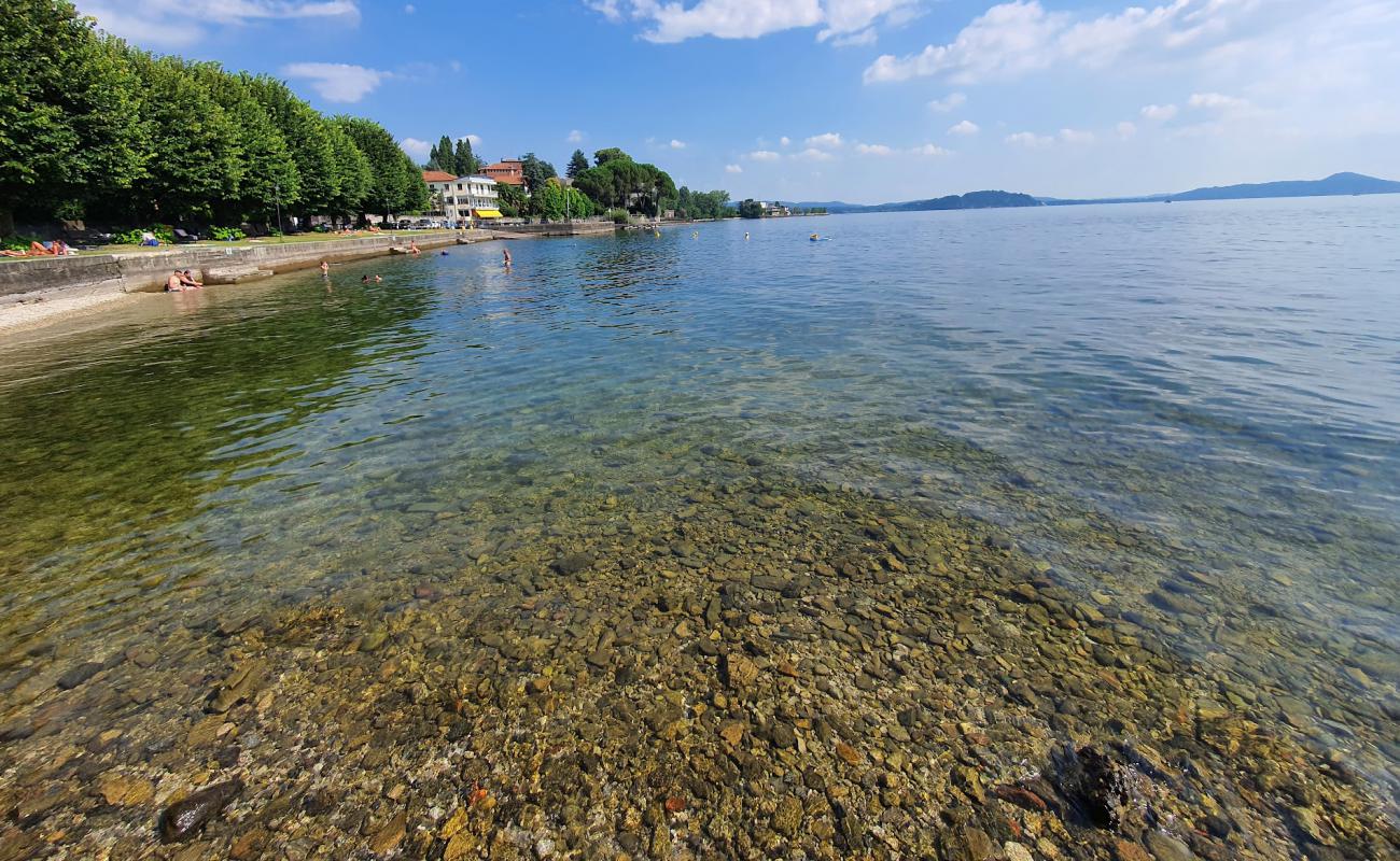 Фото Spiaggia di Arolo с песок с камнями поверхностью