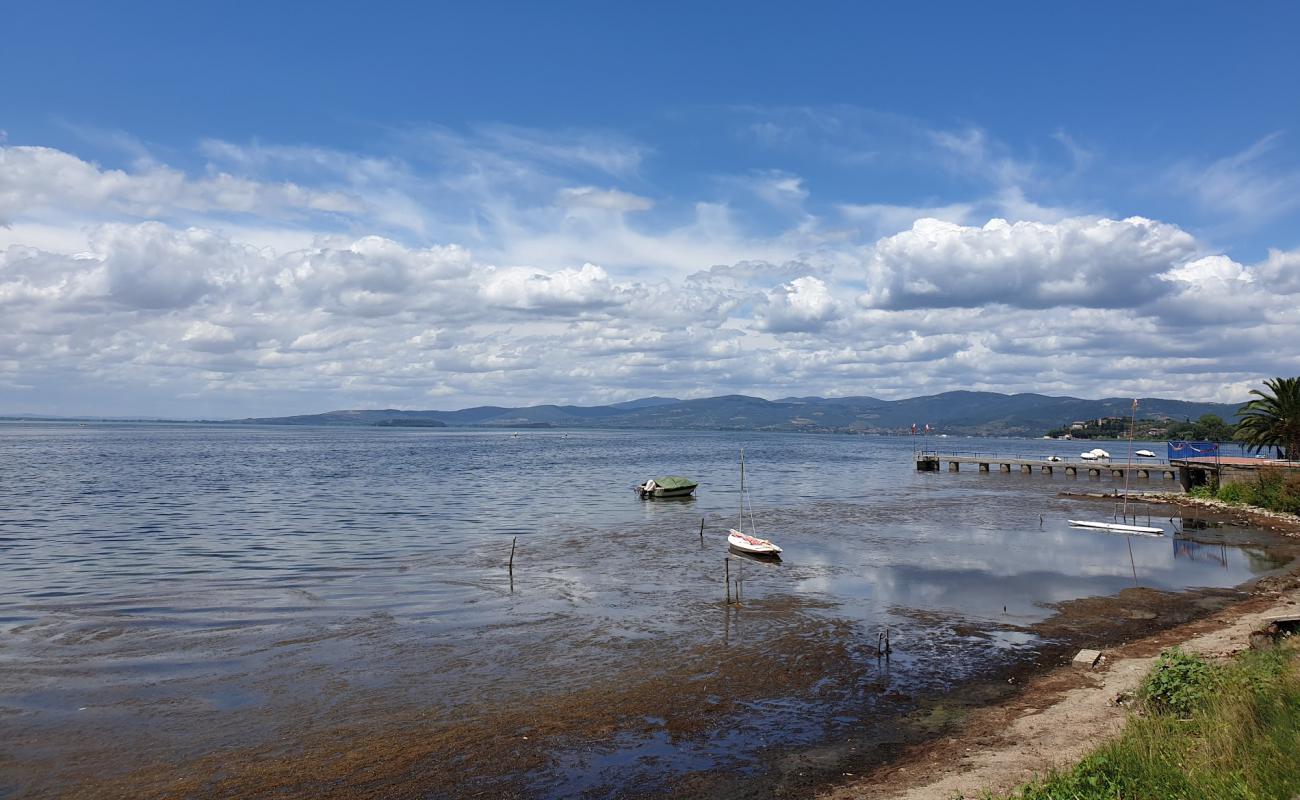 Фото Via Ghandi Beach с трава поверхностью