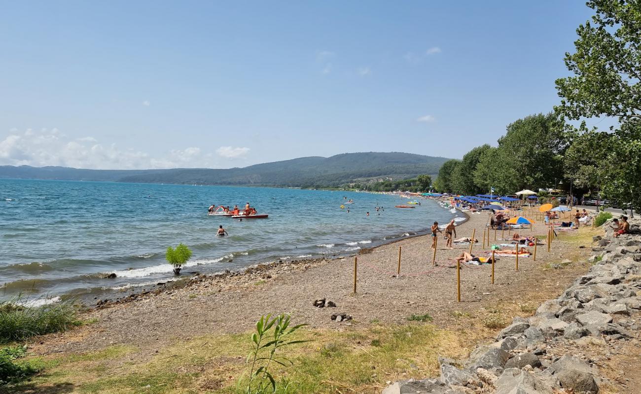 Фото Spiaggia de Acqua Chiara с серая чистая галька поверхностью