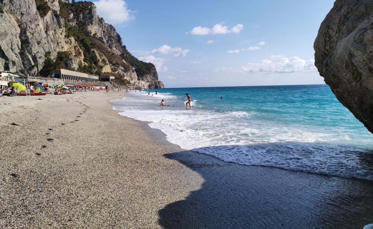 Фото Spiaggia dei Saraceni с белая чистая галька поверхностью