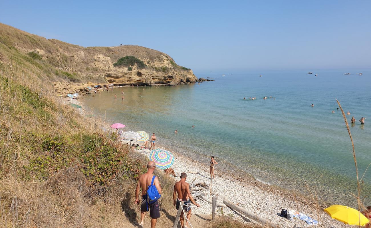 Фото Spiaggia dei Libertini с песок с галькой поверхностью