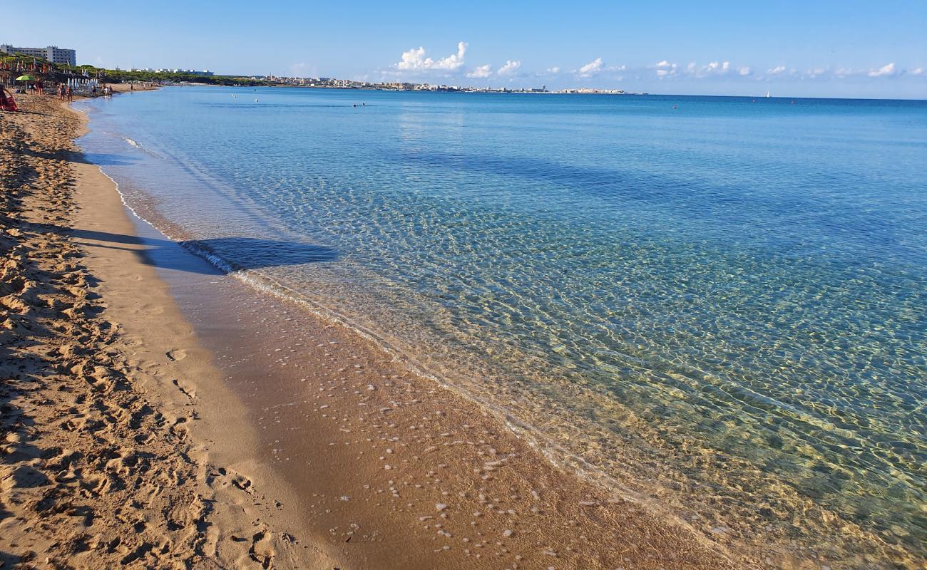 Фото Spiaggia Padula Bianca с светлый песок поверхностью