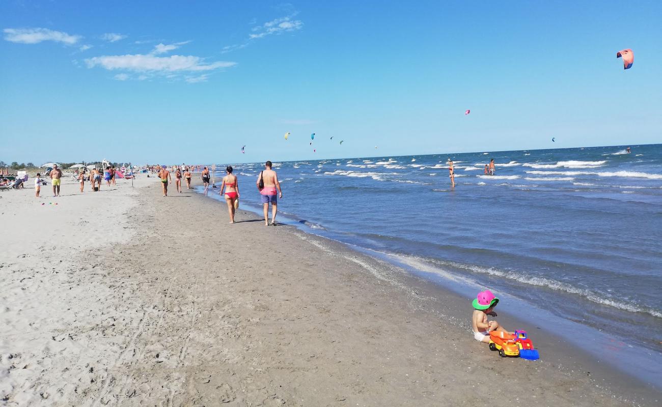 Фото Spiaggia Barricata с светлый песок поверхностью