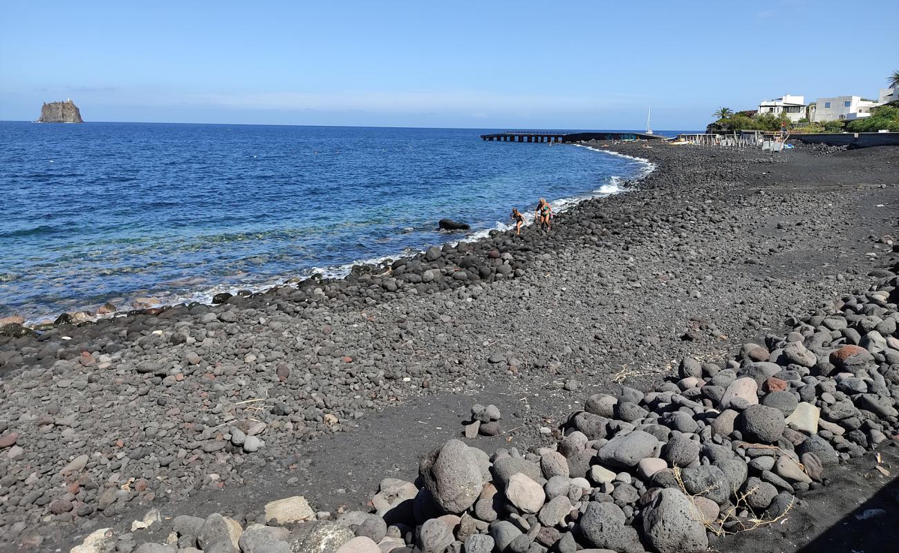 Фото Spiaggia Lunga с песок с камнями поверхностью