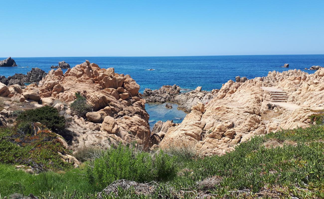 Фото Spiaggia Li Baietti с камни поверхностью