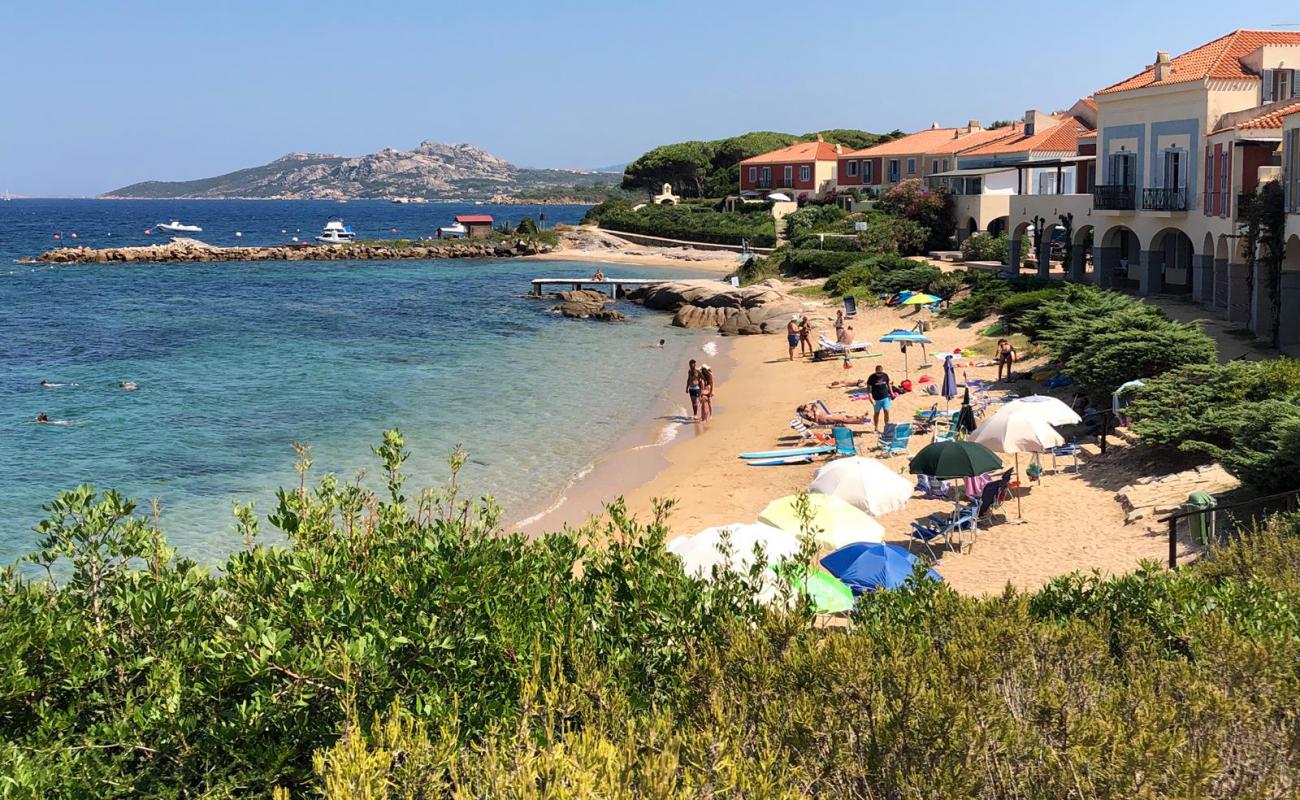 Фото Spiaggia Porto Faro с светлый песок поверхностью