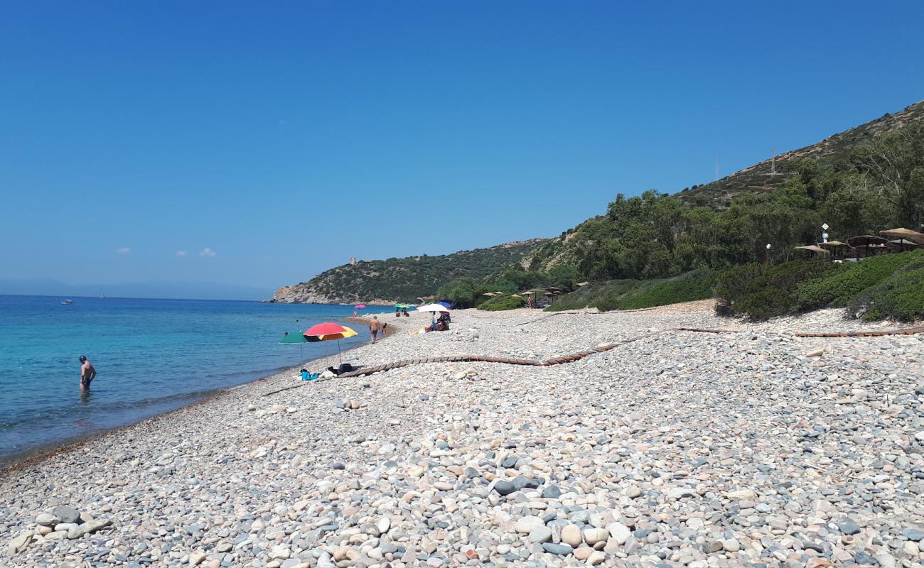 Фото Spiaggia Is Canaleddus с серая галька поверхностью