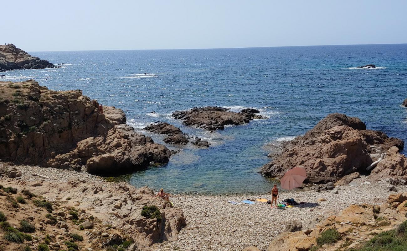 Фото Spiaggia di Capo Pecora с камни поверхностью