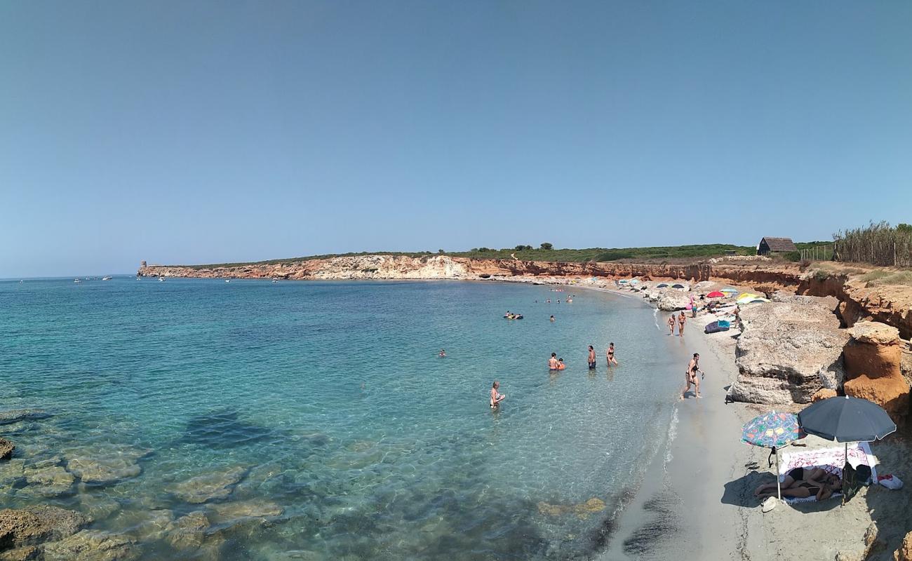 Фото Spiaggia di Seu с светлый песок поверхностью